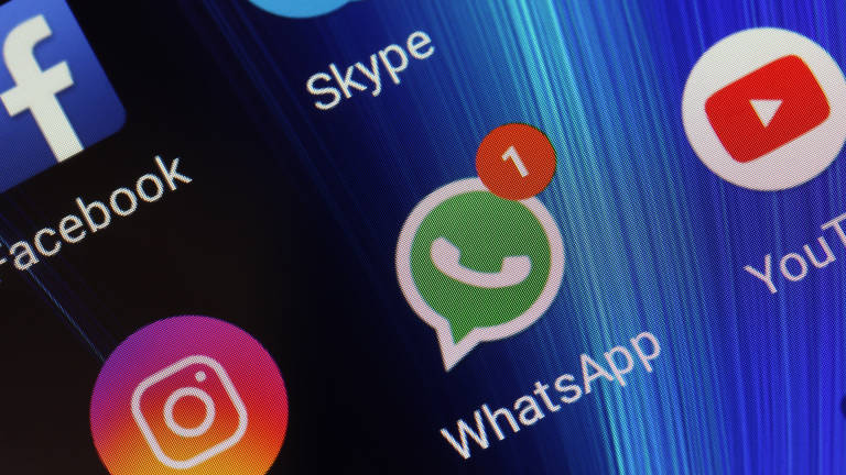 Adygea, Russia - January 2, 2018: app icons WhatsApp, YouTube, instagram, Facebook and Skype on the screen of the smartphone Xiaomi