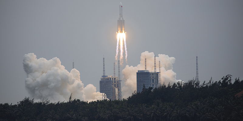 A Long March 5B rocket carrying a module for a Chinese space station lifts off from the Wenchang Spacecraft Launch Site in Wenchang in southern China's Hainan Province, Thursday, April 29, 2021. China has launched the core module on Thursday for its first permanent space station that will host astronauts long-term. (Chinatopix via AP)