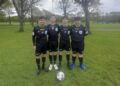 Quattro giovani arbitri della sezione Aia di Ragusa impegnati in una competizione in Danimarca