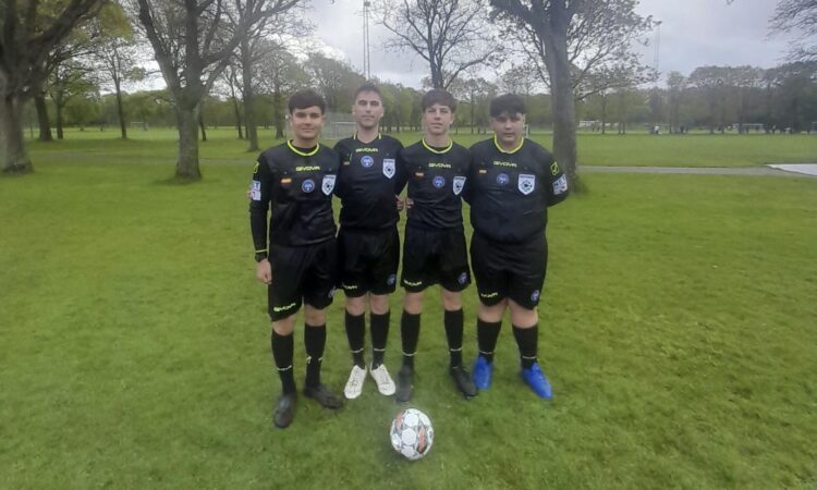Quattro giovani arbitri della sezione Aia di Ragusa impegnati in una competizione in Danimarca